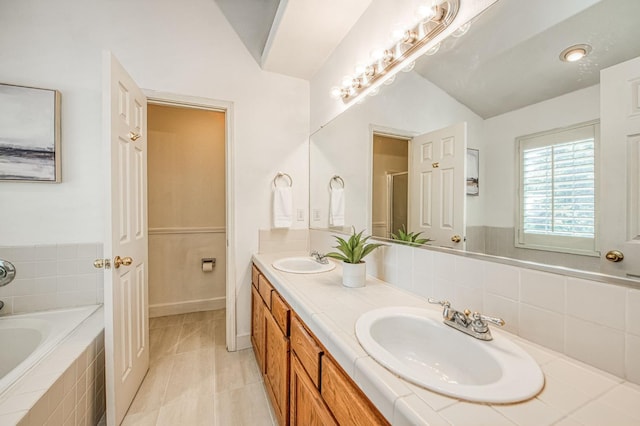 198 Decatur Ave, Clovis, CA 93611 - full bathroom with a garden tub, double vanity, tile patterned floors, and an enclosed shower