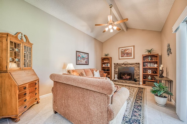 6365 N Barcus Ave, Fresno, CA 93722 - living room featuring light tile patterned floors, ceiling fan, a brick fireplace, baseboards, and a textured ceiling