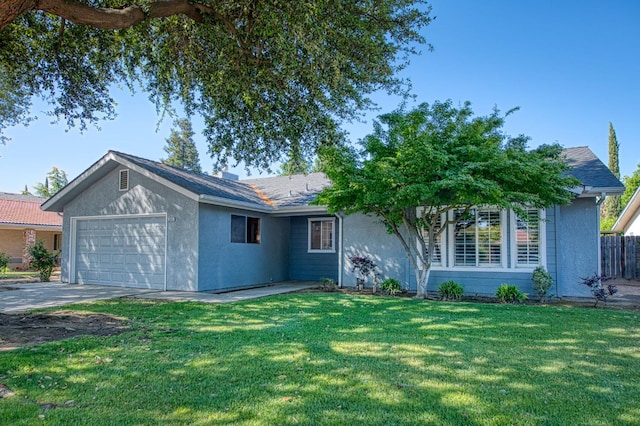 6365 N Barcus Ave, Fresno, CA 93722 - ranch-style house featuring a garage and driveway