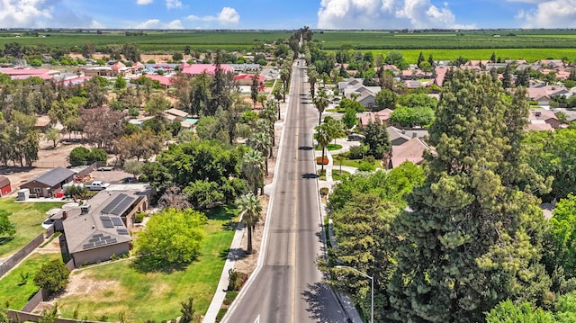 aerial view of property's location featuring nearby suburban area