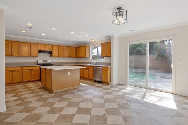 3225 N Mendonca St, Visalia, CA 93291 - kitchen featuring appliances with stainless steel finishes, a sink, under cabinet range hood, light countertops, and crown molding