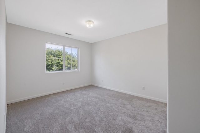 3225 N Mendonca St, Visalia, CA 93291 - carpeted empty room featuring baseboards