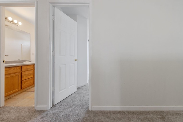 3225 N Mendonca St, Visalia, CA 93291 - hall with light carpet and baseboards