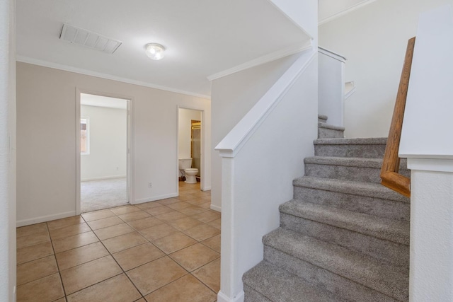 3225 N Mendonca St, Visalia, CA 93291 - stairs featuring ornamental molding, tile patterned floors, and baseboards