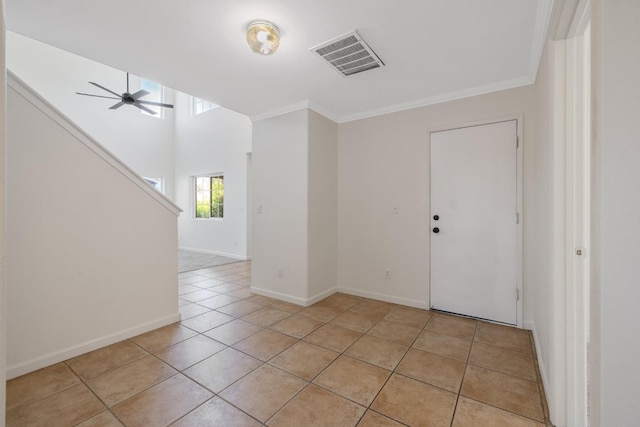 3225 N Mendonca St, Visalia, CA 93291 - unfurnished room with light tile patterned floors, ceiling fan, stairway, ornamental molding, and baseboards