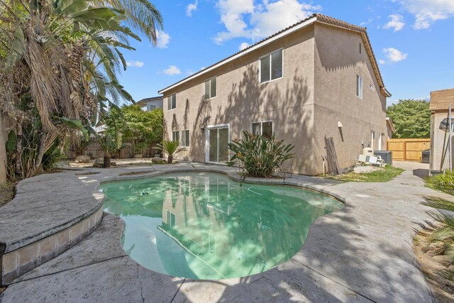 3225 N Mendonca St, Visalia, CA 93291 - view of swimming pool with a fenced backyard
