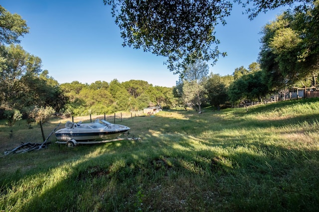 47438 Cheyenne Rd, Coarsegold, CA 93614 - view of grassy yard featuring a view of trees