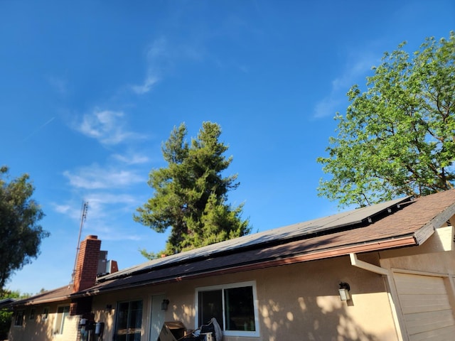 2409 N Valentine Ave, Fresno, CA 93722 - exterior view of a chimney and stucco siding