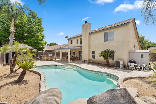 5532 N Cleo Ave, Fresno, CA 93722 - view of pool featuring a patio area, central AC, and fence