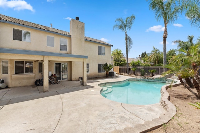 5532 N Cleo Ave, Fresno, CA 93722 - view of pool featuring a fenced backyard, a patio, and central air condition unit