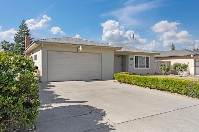 638 W Dennis Dr, Clovis, CA 93612 - ranch-style house with a garage, stucco siding, concrete driveway, fence, and a chimney