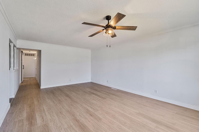638 W Dennis Dr, Clovis, CA 93612 - empty room featuring a ceiling fan, a textured ceiling, crown molding, light wood-style flooring, and baseboards