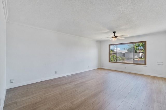 638 W Dennis Dr, Clovis, CA 93612 - unfurnished room with a textured ceiling, wood finished floors, a ceiling fan, and baseboards