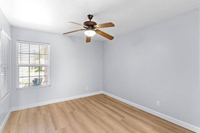 3656 N Laverne Ave, Fresno, CA 93727 - spare room featuring light wood-style floors, ceiling fan, and baseboards