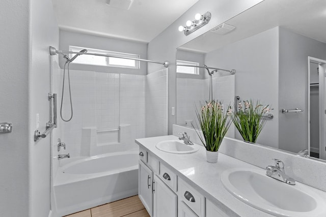 3656 N Laverne Ave, Fresno, CA 93727 - bathroom featuring tub / shower combination and double vanity