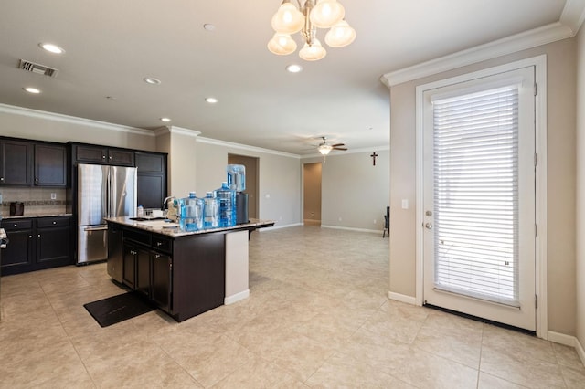 3874 Hampton Way, Clovis, CA 93619 - kitchen with freestanding refrigerator, a sink, ornamental molding, a ceiling fan, and open floor plan