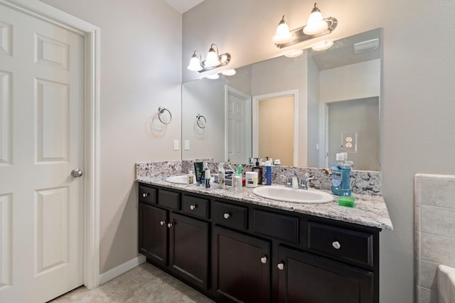 3874 Hampton Way, Clovis, CA 93619 - bathroom with double vanity and tile patterned flooring
