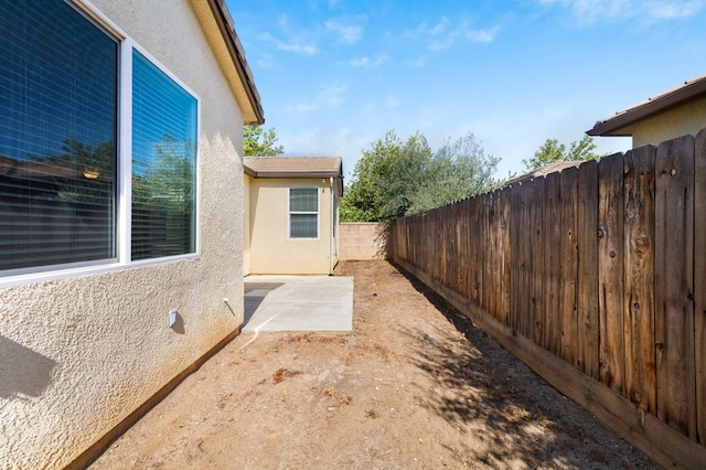 3874 Hampton Way, Clovis, CA 93619 - fenced backyard with a patio area