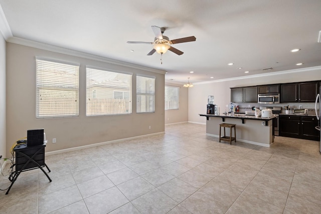 3874 Hampton Way, Clovis, CA 93619 - living area featuring crown molding, light tile patterned flooring, ceiling fan, recessed lighting, and a chandelier