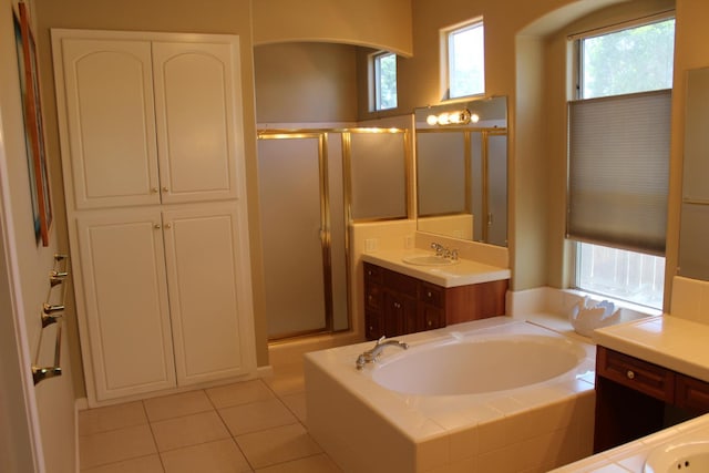 373 W Houston Ave, Clovis, CA 93611 - full bath with a shower stall, a bath, vanity, and tile patterned flooring