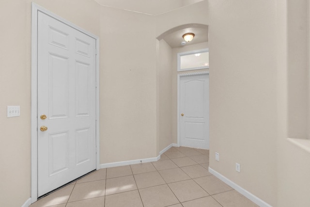 373 W Houston Ave, Clovis, CA 93611 - corridor with arched walkways and light tile patterned floors