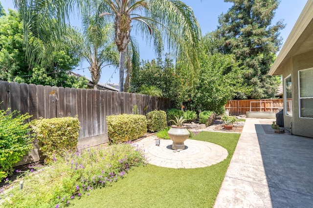 373 W Houston Ave, Clovis, CA 93611 - fenced backyard featuring a patio area