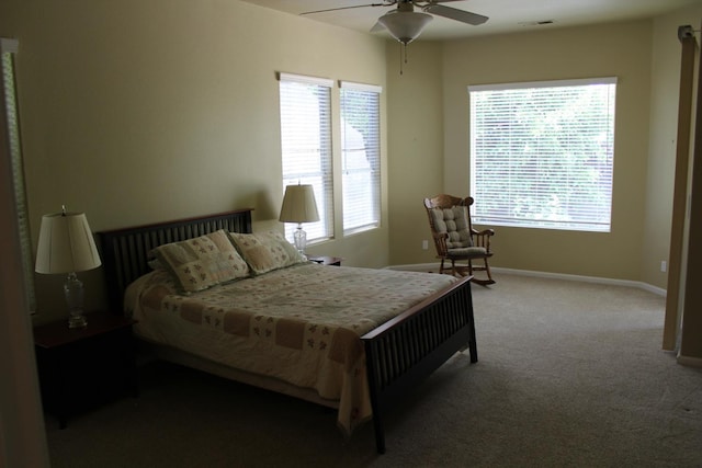 373 W Houston Ave, Clovis, CA 93611 - bedroom featuring carpet floors, multiple windows, baseboards, and ceiling fan
