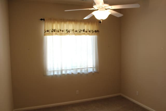 373 W Houston Ave, Clovis, CA 93611 - unfurnished room featuring carpet flooring, baseboards, and a ceiling fan