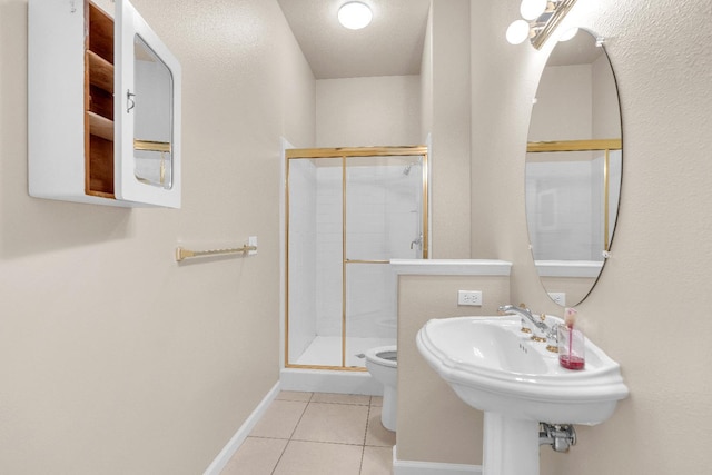 373 W Houston Ave, Clovis, CA 93611 - bathroom with tile patterned flooring and a stall shower