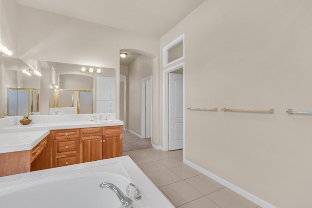 373 W Houston Ave, Clovis, CA 93611 - full bathroom with vanity, tile patterned floors, a bath, and a shower stall