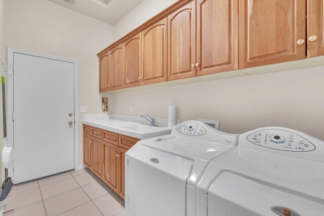373 W Houston Ave, Clovis, CA 93611 - laundry room featuring cabinet space, washer and dryer, and light tile patterned flooring