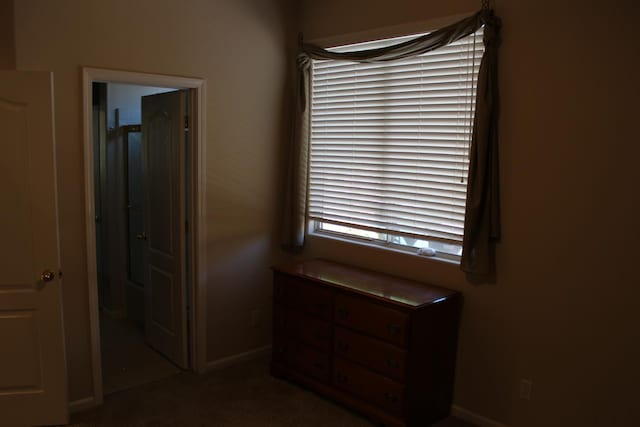 373 W Houston Ave, Clovis, CA 93611 - unfurnished bedroom with baseboards and carpet flooring