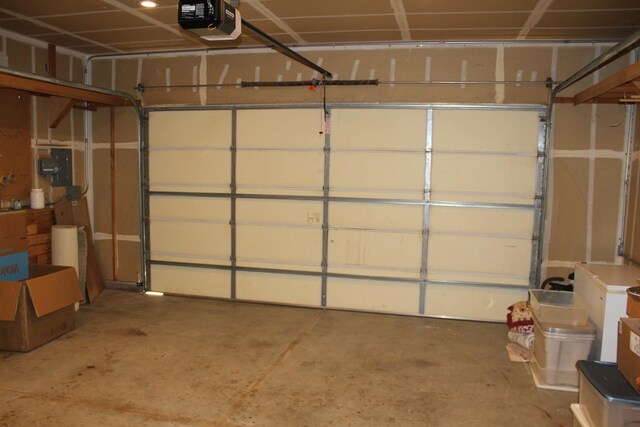 373 W Houston Ave, Clovis, CA 93611 - garage featuring a garage door opener