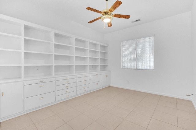373 W Houston Ave, Clovis, CA 93611 - unfurnished room with a ceiling fan and built in shelves