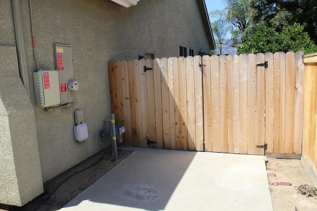 373 W Houston Ave, Clovis, CA 93611 - view of property exterior with stucco siding, a gate, and fence