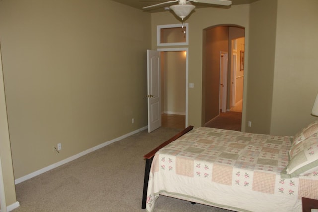 373 W Houston Ave, Clovis, CA 93611 - bedroom with arched walkways, carpet flooring, baseboards, and ceiling fan