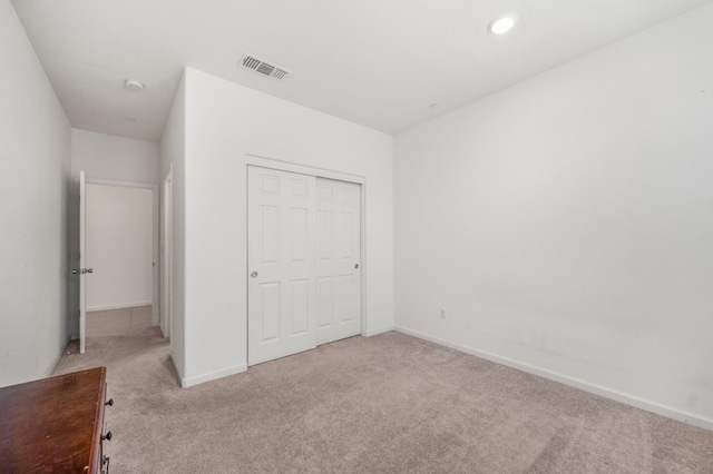 746 E Curtis Ave, Fowler, CA 93625 - unfurnished bedroom with carpet floors, a closet, baseboards, and recessed lighting