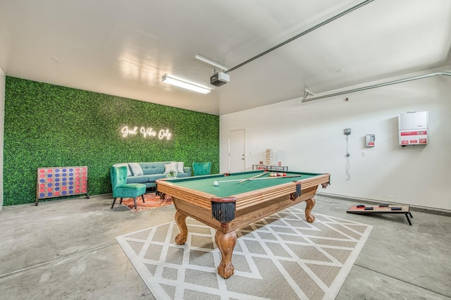 playroom featuring concrete flooring, a garage, and billiards table