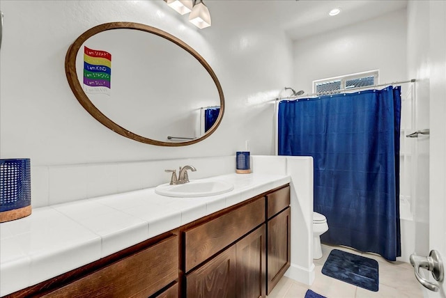 2315 W Malone St, Hanford, CA 93230 - full bath with toilet, tile patterned floors, and vanity