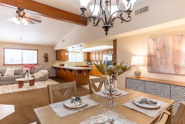 16895 Rd 30 1/2, Madera, CA 93636 - dining area with a ceiling fan, plenty of natural light, a chandelier, and light carpet