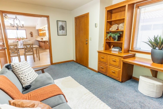 16895 Rd 30 1/2, Madera, CA 93636 - living area featuring a chandelier, baseboards, light colored carpet, and an office area