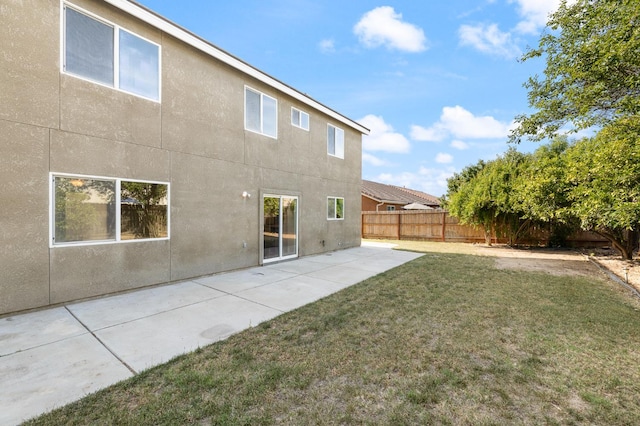798 S Burgan Ave, Fresno, CA 93727 - rear view of house with stucco siding and a patio