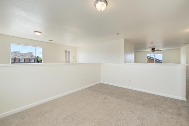 798 S Burgan Ave, Fresno, CA 93727 - carpeted empty room featuring baseboards, healthy amount of natural light, and a ceiling fan