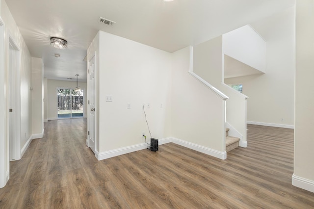 798 S Burgan Ave, Fresno, CA 93727 - foyer featuring wood finished floors, baseboards, and stairway