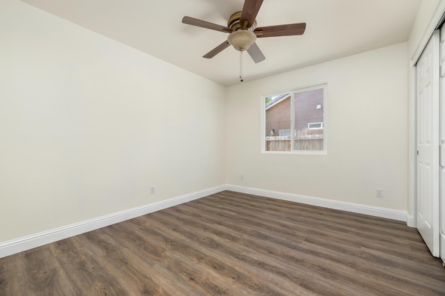 798 S Burgan Ave, Fresno, CA 93727 - unfurnished bedroom with baseboards, dark wood-style floors, a closet, and ceiling fan