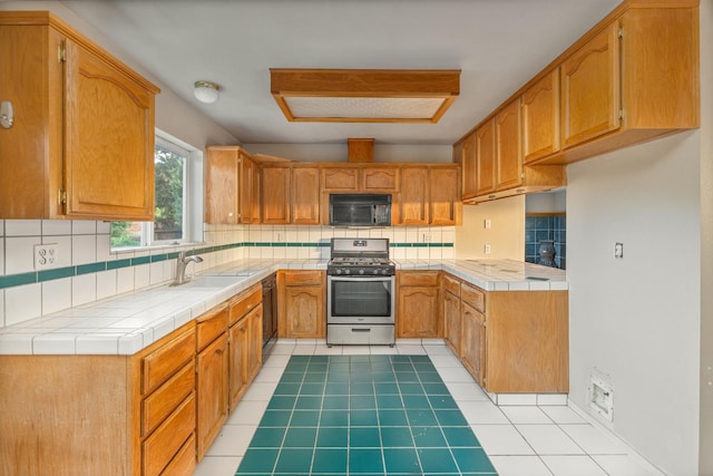 5664 Clouds Rst, Mariposa, CA 95338 - kitchen featuring black appliances, a sink, decorative backsplash, light tile patterned floors, and tile countertops