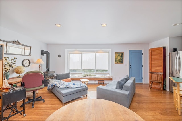 5664 Clouds Rst, Mariposa, CA 95338 - living area with a wood stove, light wood-type flooring, and recessed lighting