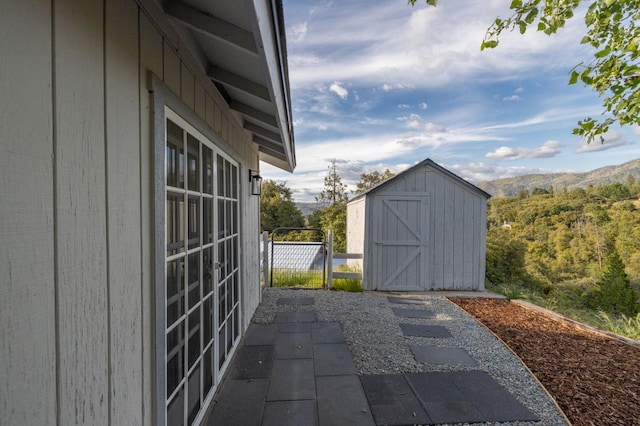 5664 Clouds Rst, Mariposa, CA 95338 - view of patio / terrace with a storage shed and an outdoor structure