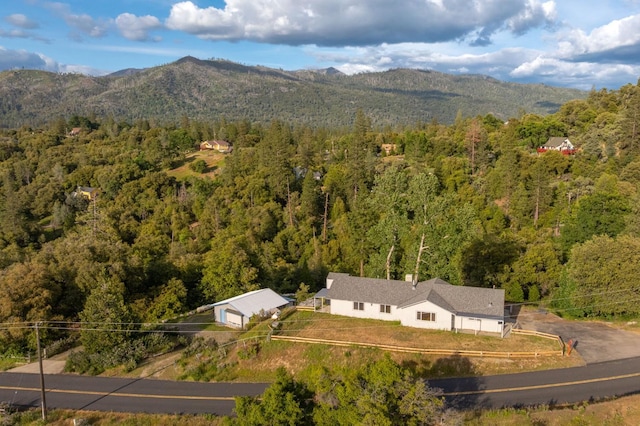 5664 Clouds Rst, Mariposa, CA 95338 - aerial view of property and surrounding area featuring a forest and mountains