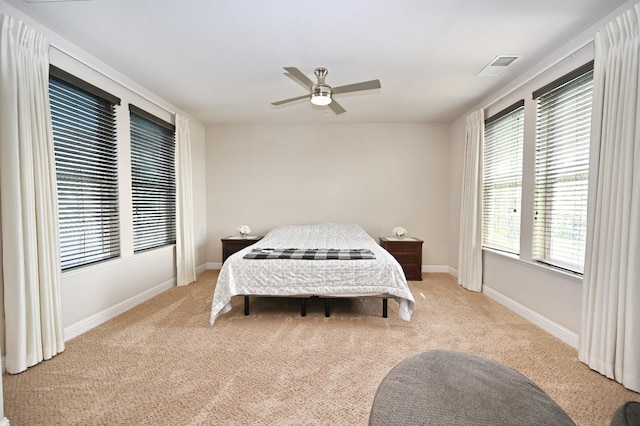 11332 N Cherry Sage Ave, Fresno, CA 93730 - bedroom featuring light carpet, baseboards, and ceiling fan